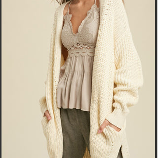 Sweater cardigan cream pockets and side slits